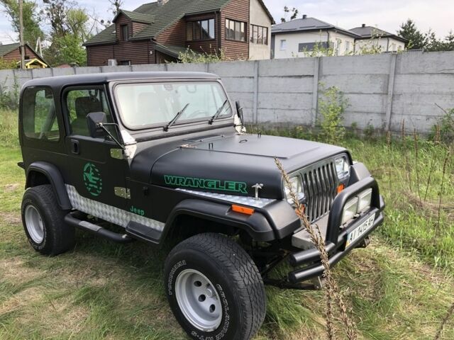 Чорний Джип Wrangler, об'ємом двигуна 4 л та пробігом 1 тис. км за 10000 $, фото 2 на Automoto.ua