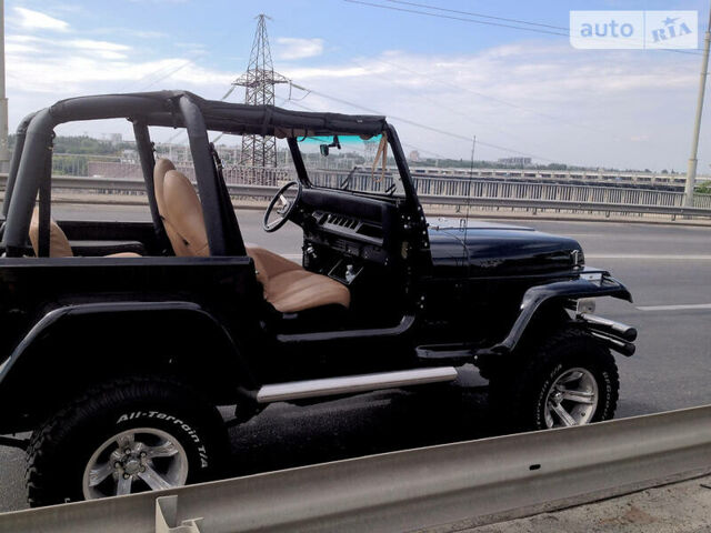 Чорний Джип Wrangler, об'ємом двигуна 2.5 л та пробігом 50 тис. км за 10000 $, фото 12 на Automoto.ua