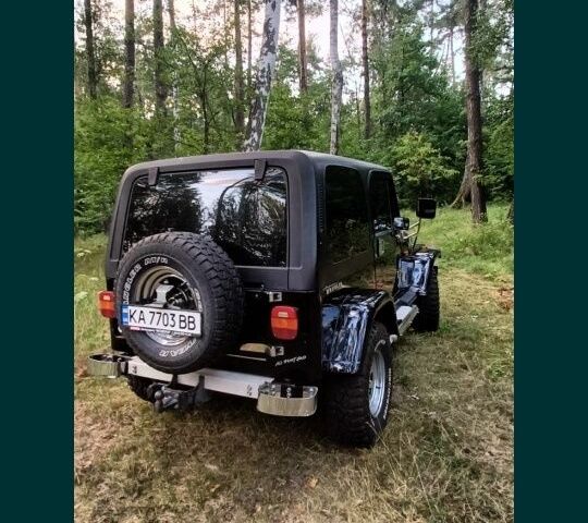 Чорний Джип Wrangler, об'ємом двигуна 0 л та пробігом 100 тис. км за 10500 $, фото 1 на Automoto.ua