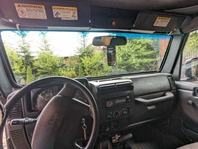 Чорний Джип Wrangler, об'ємом двигуна 4 л та пробігом 118 тис. км за 18900 $, фото 13 на Automoto.ua