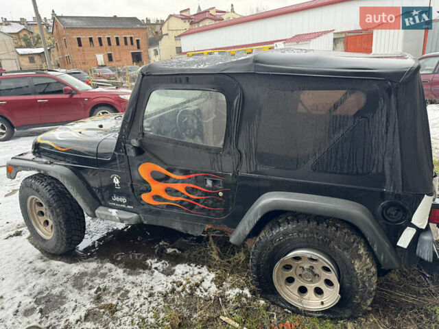 Чорний Джип Wrangler, об'ємом двигуна 2.4 л та пробігом 169 тис. км за 8200 $, фото 3 на Automoto.ua