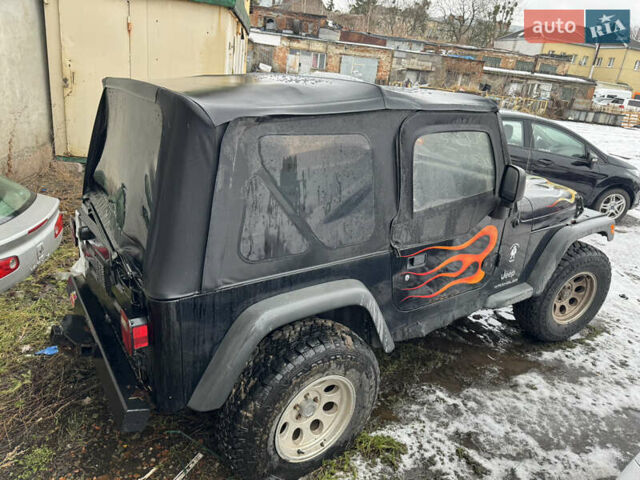 Чорний Джип Wrangler, об'ємом двигуна 2.4 л та пробігом 169 тис. км за 8200 $, фото 2 на Automoto.ua