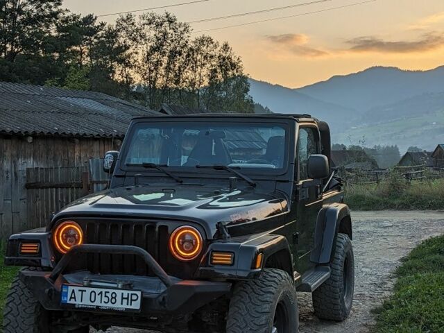 Чорний Джип Wrangler, об'ємом двигуна 4 л та пробігом 118 тис. км за 18900 $, фото 4 на Automoto.ua