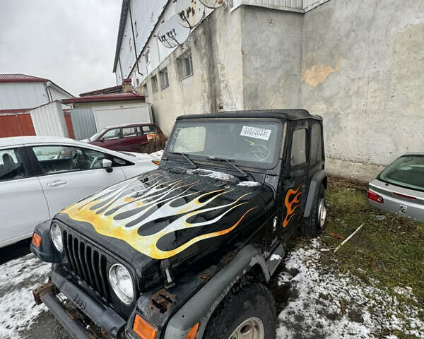 Чорний Джип Wrangler, об'ємом двигуна 2.4 л та пробігом 169 тис. км за 8200 $, фото 1 на Automoto.ua