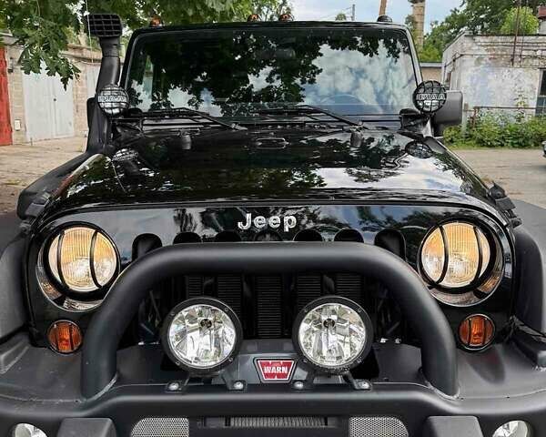Чорний Джип Wrangler, об'ємом двигуна 3.6 л та пробігом 102 тис. км за 33000 $, фото 3 на Automoto.ua