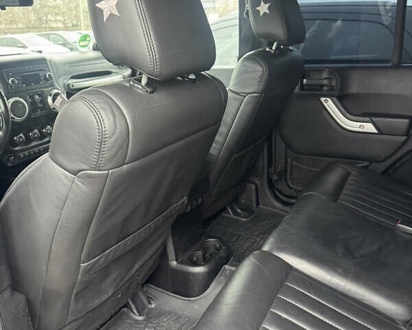 Черный Джип Вранглер, объемом двигателя 2.8 л и пробегом 164 тыс. км за 22999 $, фото 1 на Automoto.ua