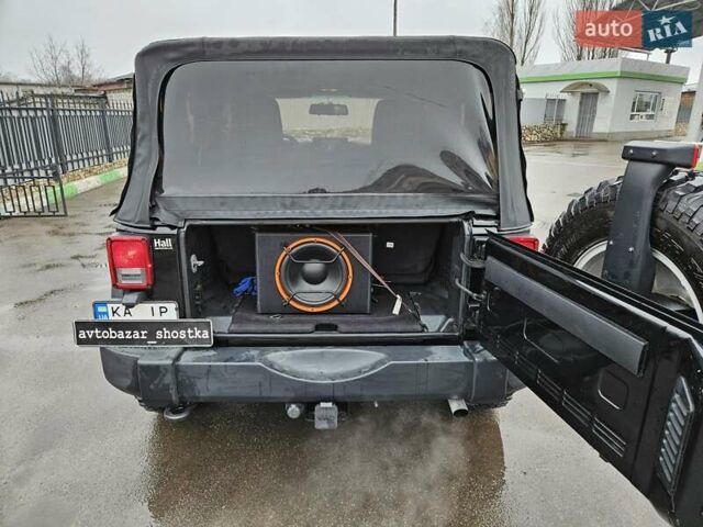Черный Джип Вранглер, объемом двигателя 3.6 л и пробегом 210 тыс. км за 17800 $, фото 14 на Automoto.ua
