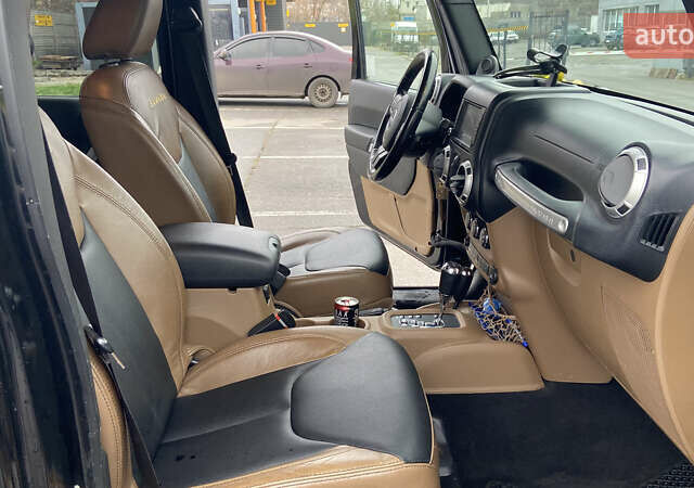 Черный Джип Вранглер, объемом двигателя 3.6 л и пробегом 178 тыс. км за 21000 $, фото 11 на Automoto.ua