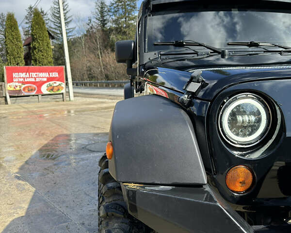 Чорний Джип Wrangler, об'ємом двигуна 2.8 л та пробігом 153 тис. км за 25000 $, фото 11 на Automoto.ua