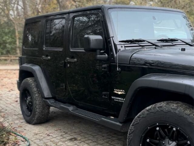 Чорний Джип Wrangler, об'ємом двигуна 2.8 л та пробігом 200 тис. км за 30000 $, фото 2 на Automoto.ua