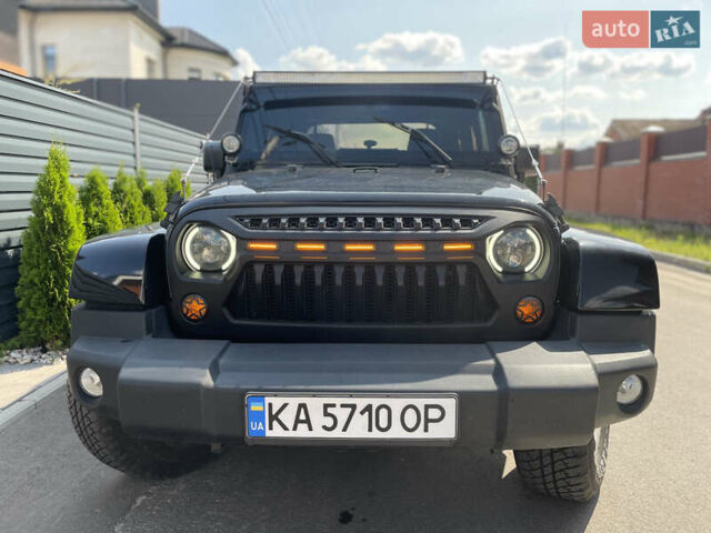 Черный Джип Вранглер, объемом двигателя 3.6 л и пробегом 168 тыс. км за 18900 $, фото 2 на Automoto.ua