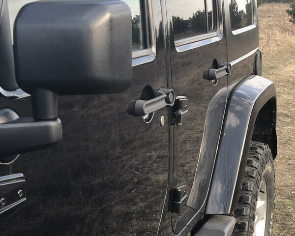 Черный Джип Вранглер, объемом двигателя 2.77 л и пробегом 175 тыс. км за 26900 $, фото 3 на Automoto.ua