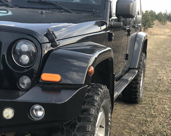 Черный Джип Вранглер, объемом двигателя 2.77 л и пробегом 175 тыс. км за 26900 $, фото 2 на Automoto.ua