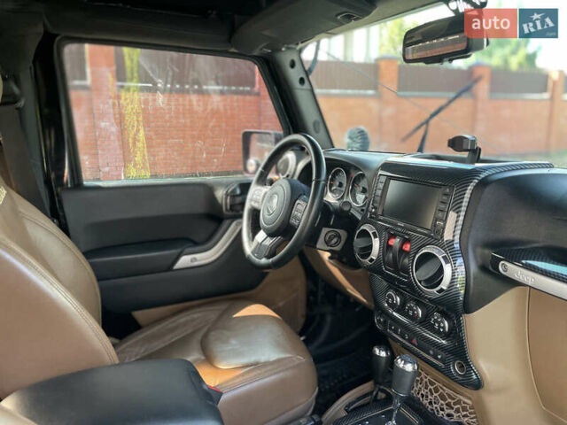 Черный Джип Вранглер, объемом двигателя 3.6 л и пробегом 168 тыс. км за 18900 $, фото 18 на Automoto.ua