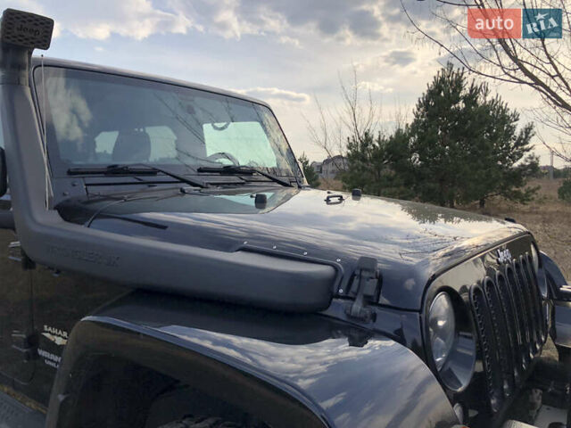 Черный Джип Вранглер, объемом двигателя 2.77 л и пробегом 175 тыс. км за 26900 $, фото 7 на Automoto.ua
