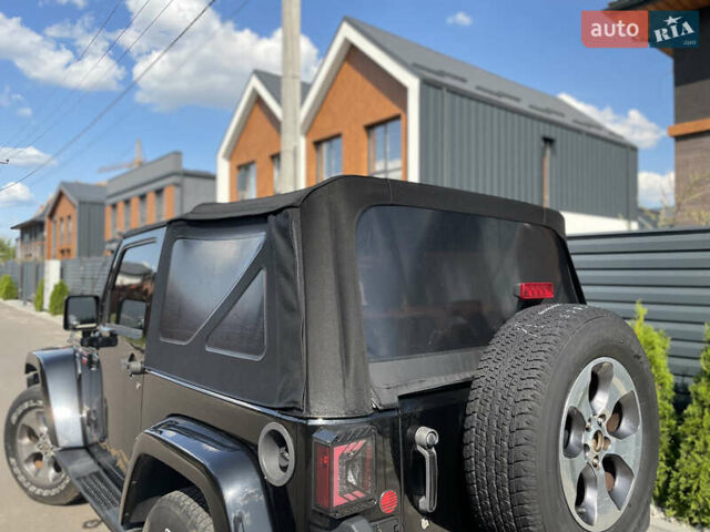 Черный Джип Вранглер, объемом двигателя 3.6 л и пробегом 168 тыс. км за 18900 $, фото 13 на Automoto.ua