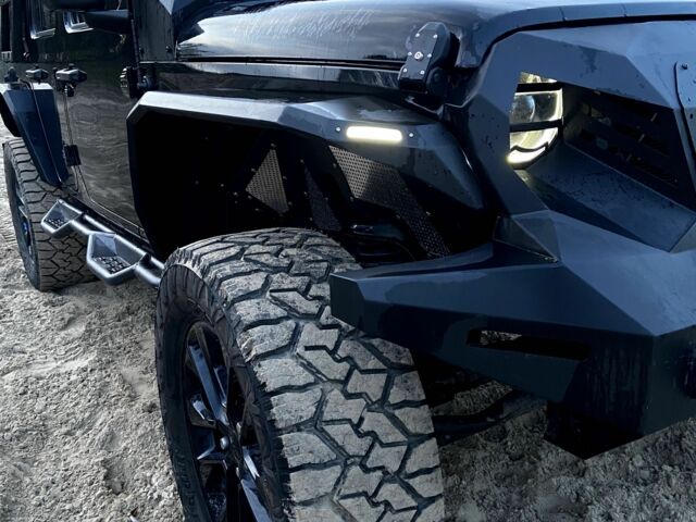 Чорний Джип Wrangler, об'ємом двигуна 2 л та пробігом 67 тис. км за 1158 $, фото 2 на Automoto.ua