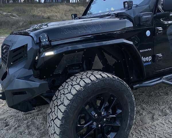 Черный Джип Вранглер, объемом двигателя 2 л и пробегом 67 тыс. км за 48900 $, фото 4 на Automoto.ua