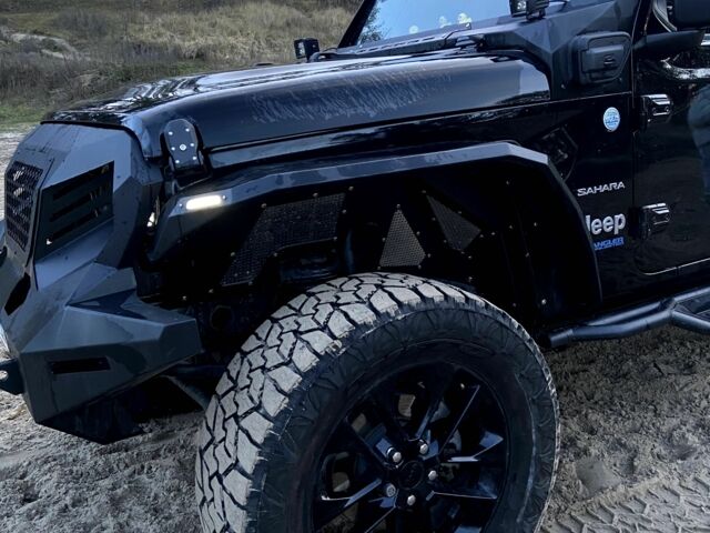Чорний Джип Wrangler, об'ємом двигуна 2 л та пробігом 67 тис. км за 1158 $, фото 4 на Automoto.ua