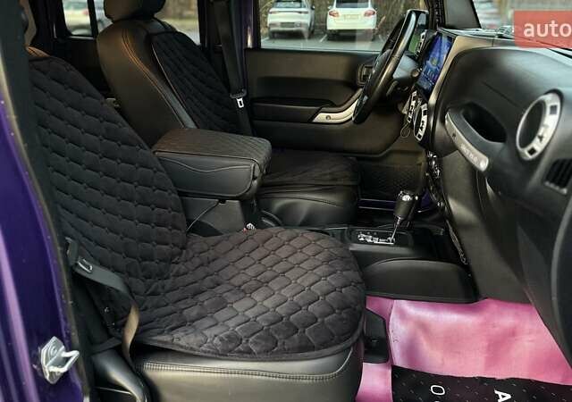 Фиолетовый Джип Вранглер, объемом двигателя 3.6 л и пробегом 70 тыс. км за 39500 $, фото 24 на Automoto.ua