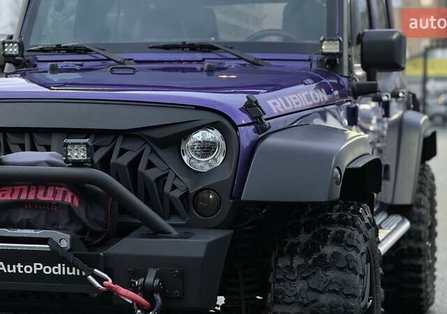 Фиолетовый Джип Вранглер, объемом двигателя 3.6 л и пробегом 70 тыс. км за 39500 $, фото 48 на Automoto.ua