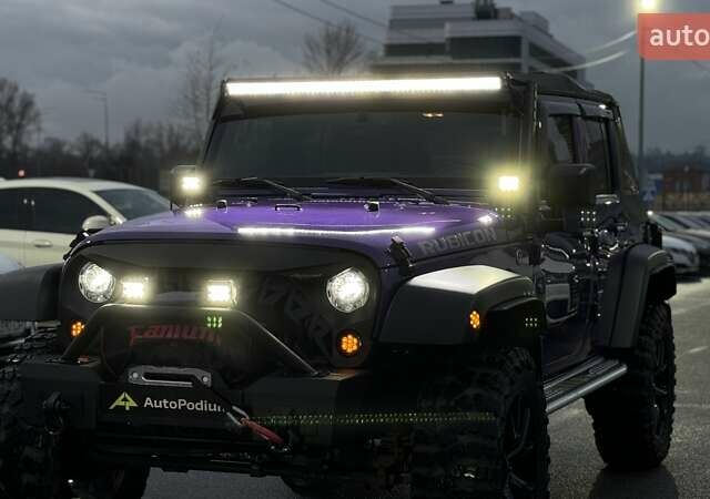 Фиолетовый Джип Вранглер, объемом двигателя 3.6 л и пробегом 70 тыс. км за 39500 $, фото 50 на Automoto.ua