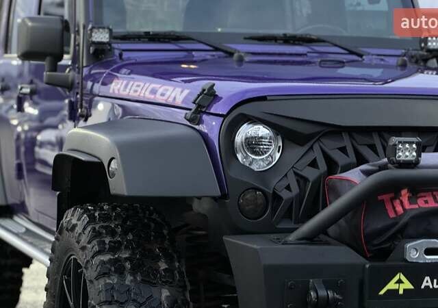 Фиолетовый Джип Вранглер, объемом двигателя 3.6 л и пробегом 70 тыс. км за 39500 $, фото 47 на Automoto.ua