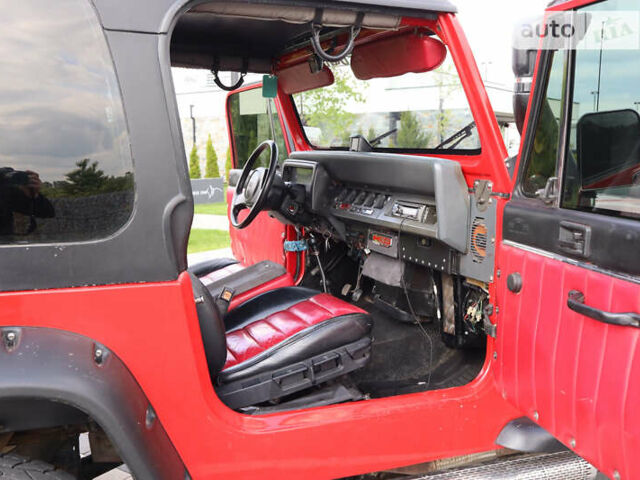 Червоний Джип Wrangler, об'ємом двигуна 4.2 л та пробігом 160 тис. км за 15500 $, фото 30 на Automoto.ua