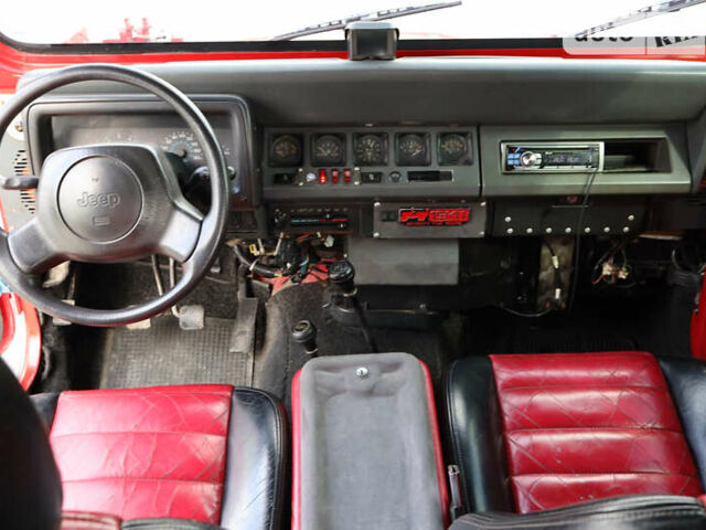 Красный Джип Вранглер, объемом двигателя 4.2 л и пробегом 160 тыс. км за 15500 $, фото 28 на Automoto.ua