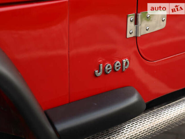 Красный Джип Вранглер, объемом двигателя 4.2 л и пробегом 160 тыс. км за 15500 $, фото 15 на Automoto.ua