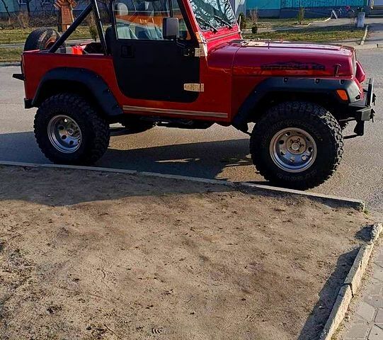 Красный Джип Вранглер, объемом двигателя 4 л и пробегом 200 тыс. км за 14500 $, фото 2 на Automoto.ua