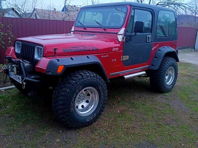 Красный Джип Вранглер, объемом двигателя 4 л и пробегом 200 тыс. км за 14500 $, фото 6 на Automoto.ua