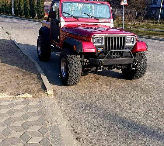 Красный Джип Вранглер, объемом двигателя 4 л и пробегом 200 тыс. км за 14500 $, фото 4 на Automoto.ua