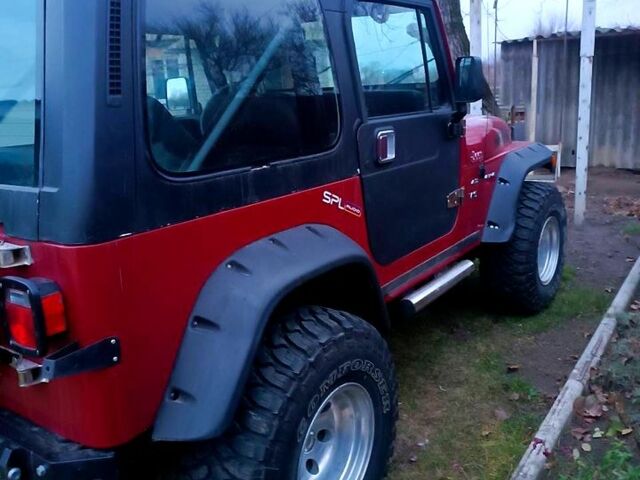 Красный Джип Вранглер, объемом двигателя 4 л и пробегом 200 тыс. км за 14500 $, фото 9 на Automoto.ua