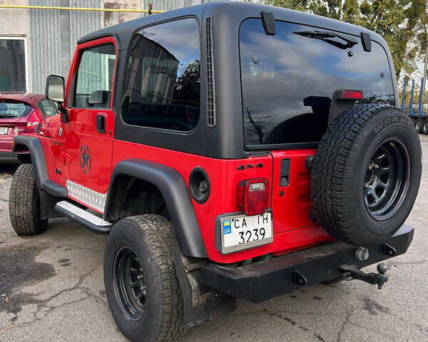Червоний Джип Wrangler, об'ємом двигуна 2.5 л та пробігом 177 тис. км за 15500 $, фото 4 на Automoto.ua