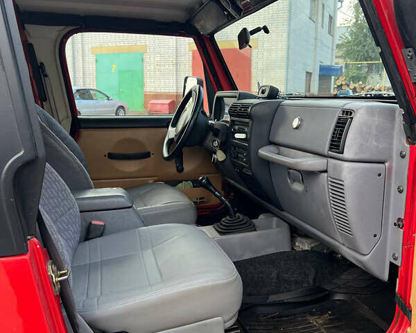 Червоний Джип Wrangler, об'ємом двигуна 2.5 л та пробігом 177 тис. км за 15500 $, фото 12 на Automoto.ua