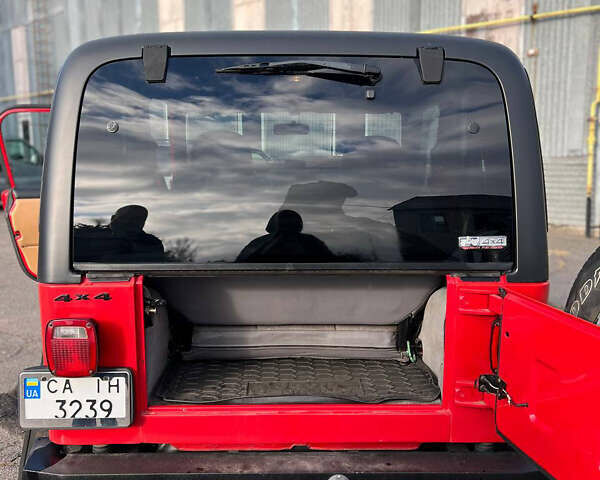 Червоний Джип Wrangler, об'ємом двигуна 2.5 л та пробігом 177 тис. км за 15500 $, фото 7 на Automoto.ua