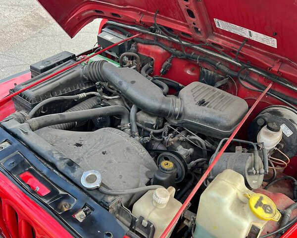 Красный Джип Вранглер, объемом двигателя 2.5 л и пробегом 177 тыс. км за 14999 $, фото 15 на Automoto.ua