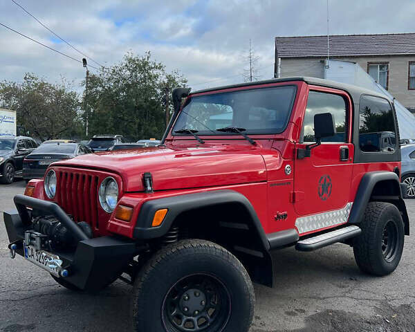 Червоний Джип Wrangler, об'ємом двигуна 2.5 л та пробігом 177 тис. км за 15500 $, фото 3 на Automoto.ua
