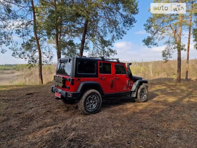 Червоний Джип Wrangler, об'ємом двигуна 2.77 л та пробігом 115 тис. км за 39000 $, фото 8 на Automoto.ua