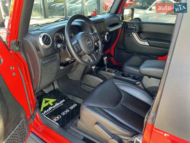 Червоний Джип Wrangler, об'ємом двигуна 2.8 л та пробігом 103 тис. км за 35200 $, фото 6 на Automoto.ua