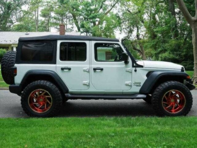 Красный Джип Вранглер, объемом двигателя 2 л и пробегом 57 тыс. км за 11000 $, фото 3 на Automoto.ua