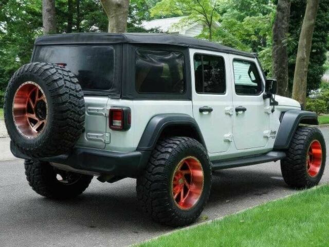 Красный Джип Вранглер, объемом двигателя 2 л и пробегом 57 тыс. км за 11000 $, фото 6 на Automoto.ua