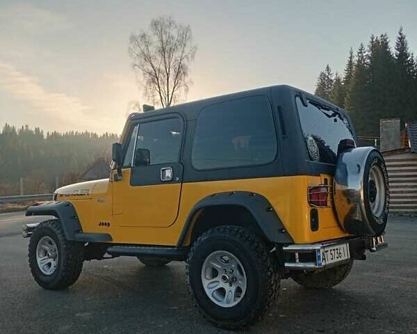 Желтый Джип Вранглер, объемом двигателя 2.5 л и пробегом 155 тыс. км за 8700 $, фото 4 на Automoto.ua