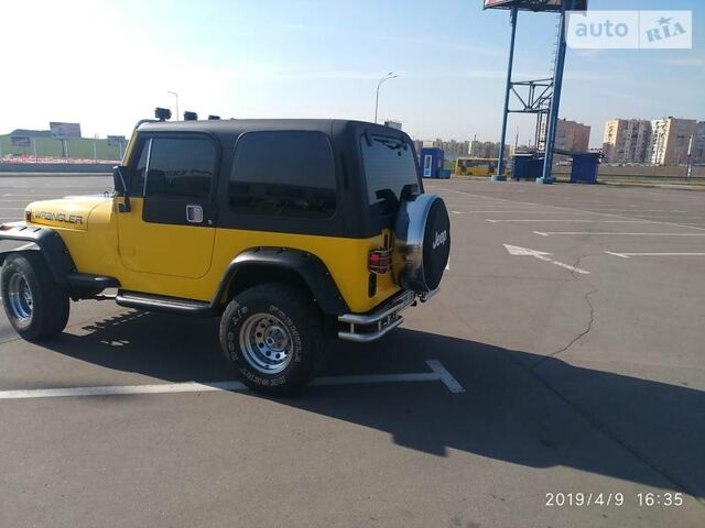 Жовтий Джип Wrangler, об'ємом двигуна 2.5 л та пробігом 180 тис. км за 14800 $, фото 10 на Automoto.ua