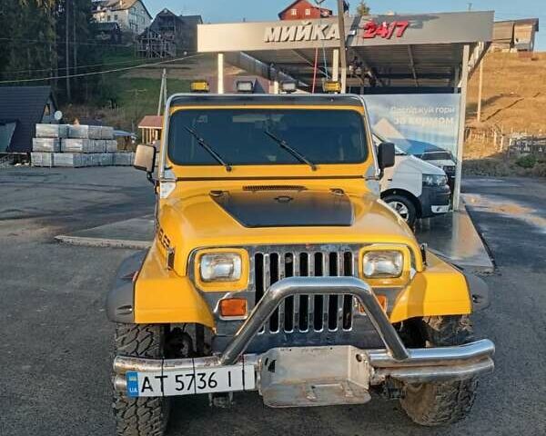 Желтый Джип Вранглер, объемом двигателя 2.5 л и пробегом 155 тыс. км за 8700 $, фото 1 на Automoto.ua