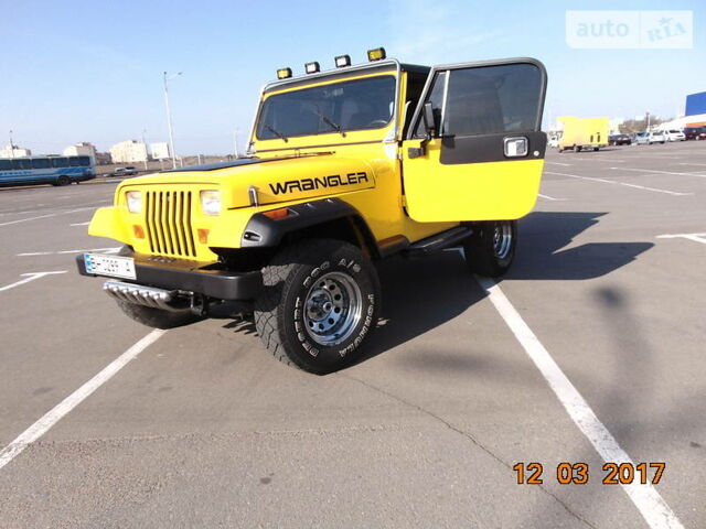 Желтый Джип Вранглер, объемом двигателя 2.5 л и пробегом 180 тыс. км за 14800 $, фото 25 на Automoto.ua