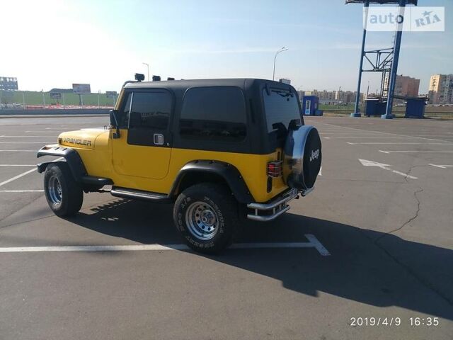 Жовтий Джип Wrangler, об'ємом двигуна 2.5 л та пробігом 180 тис. км за 14800 $, фото 11 на Automoto.ua