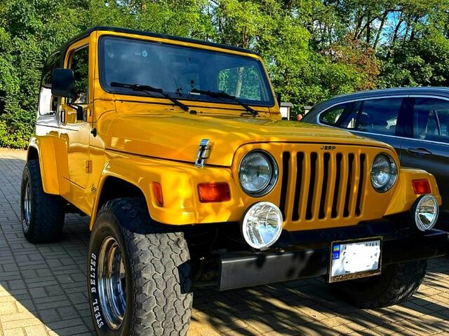 Жовтий Джип Wrangler, об'ємом двигуна 2.5 л та пробігом 151 тис. км за 16000 $, фото 2 на Automoto.ua