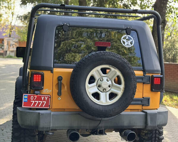 Желтый Джип Вранглер, объемом двигателя 3.6 л и пробегом 170 тыс. км за 23000 $, фото 21 на Automoto.ua